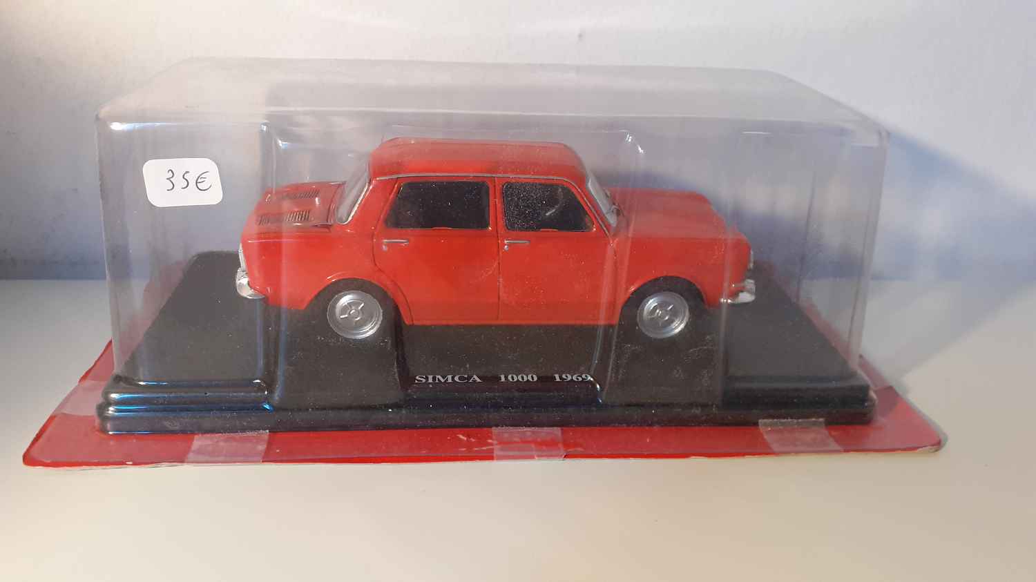 Simca 1000 rouge/orangée? de 1969 (échelle 1/24ème)